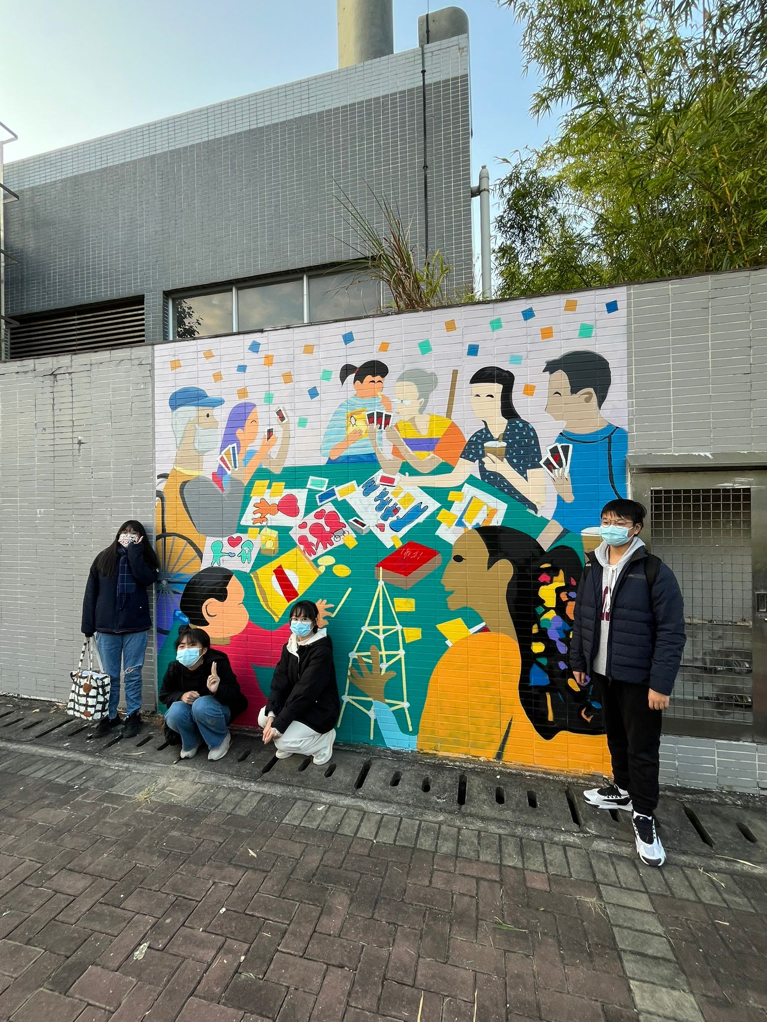 The youth participants from Ma On Shan District involved in the project took a group photo with the mural "Love is Colorful" located on the partial exterior wall of Pak Shek Kok Sewage Pumping Station No.1. The mural reflected the experiences and feelings of young people during street surveys in the area